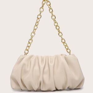 Beige Dumpling Shoulder bag with gold shoulder chain strap